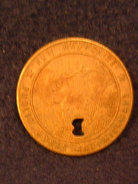 New Hampshire Public Works and Highways token. Showing the Old Man of 